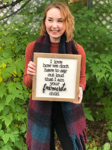 I love how we don’t have to say out loud that I am your favourite child Hardwood Framed Sign 12” x 12”